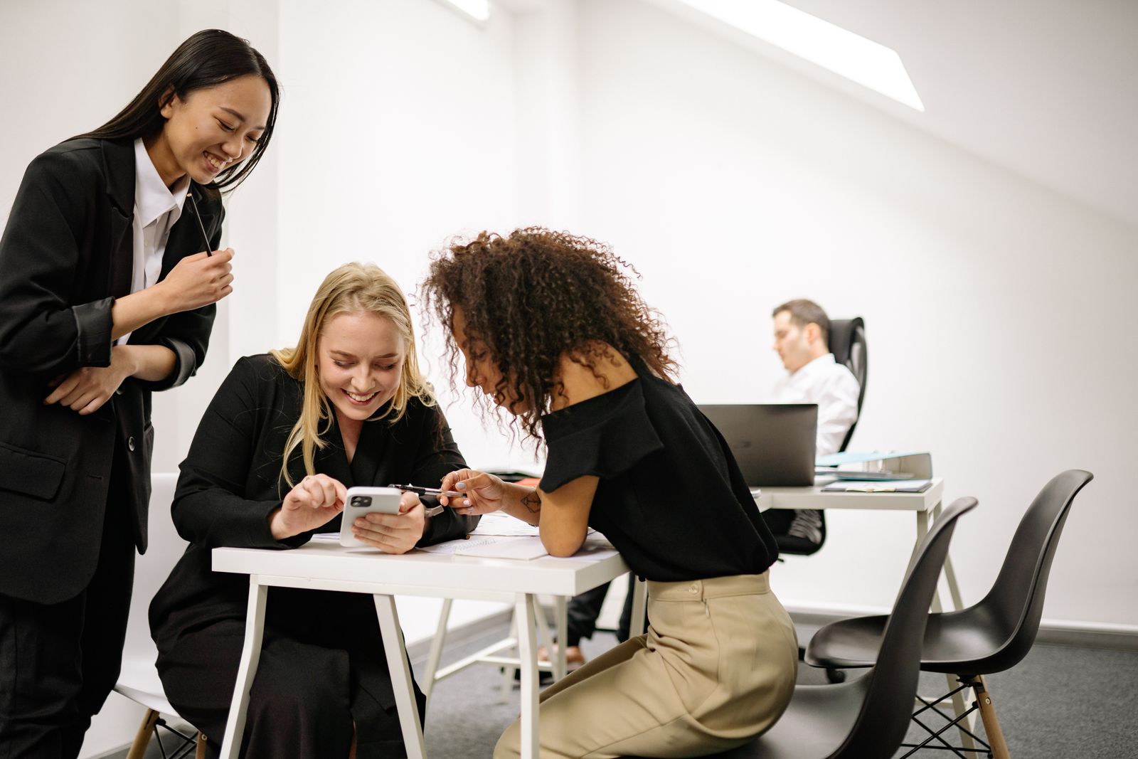 Team members chatting in the office