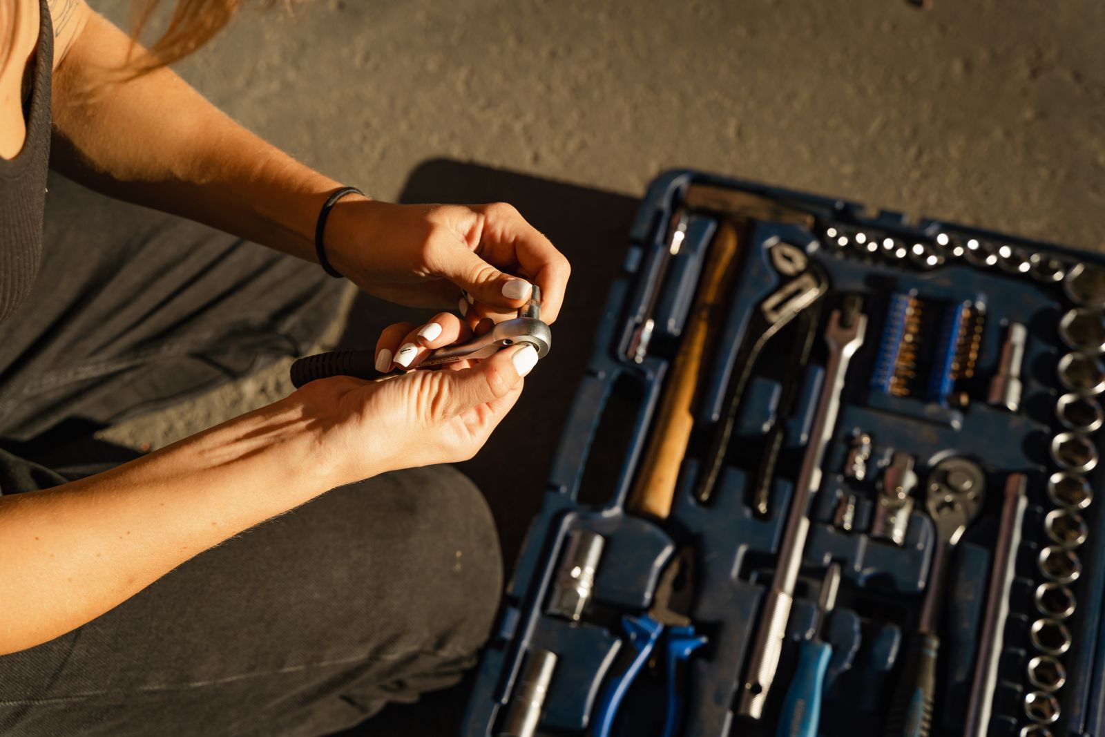 Plumber's hands fitting steel pipework